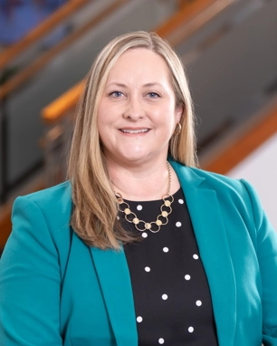 portrait of a smiling person in professional attire